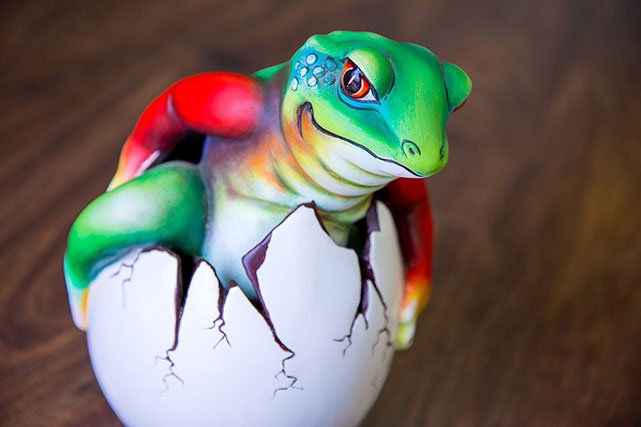 La Fuente Imports sculpture of frog coming out of egg